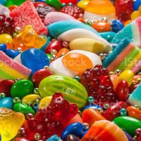 A close up landscape of colorful candy of many varieties.